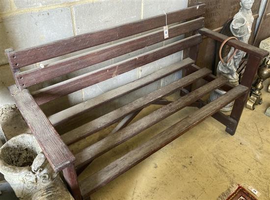 A slatted wood garden bench, width 130cm